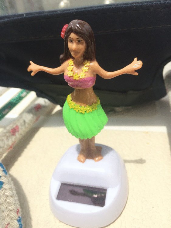 Our dollar store hula girl guardian angel looks after us when our mothers can't be on board